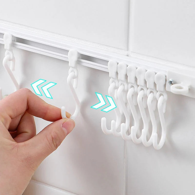 🏠50% OFF⏰ Multifunctional sliding hook, drill-free mounting, adjustable, ideal for kitchen & bathroom