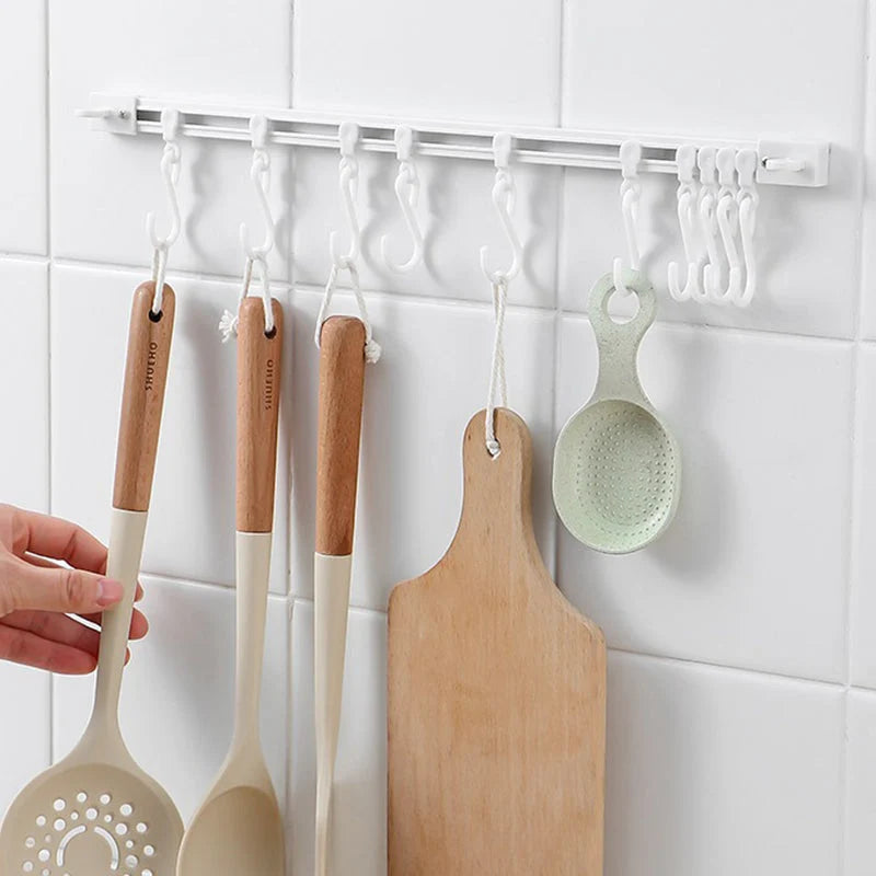 🏠50% OFF⏰ Multifunctional sliding hook, drill-free mounting, adjustable, ideal for kitchen & bathroom